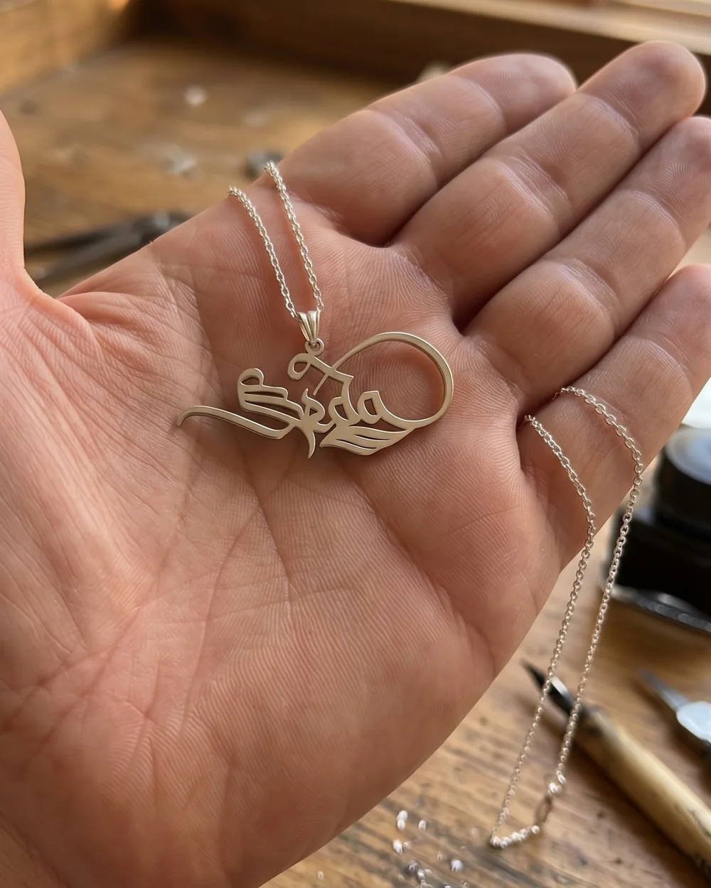 Zarif series silver calligraphy name necklace 'Seda', real piece in the palm